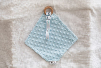Blue Minky dot polar fleece fabric on the back of baby comforter