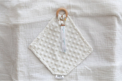 cream Minky dot polar fleece fabric on the back of baby comforter