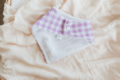 Candy Pink Gingham Bandana Dribble Bib.  Used for dribbling, teething, weaning, feeding  Soft Cotton front, absorbent Terry Towelling backing. Double snap button closure at back allowing for 0-18 months use. Machine washable - will get softer with each wash. A great gift for new parents - you can never have enough bibs!