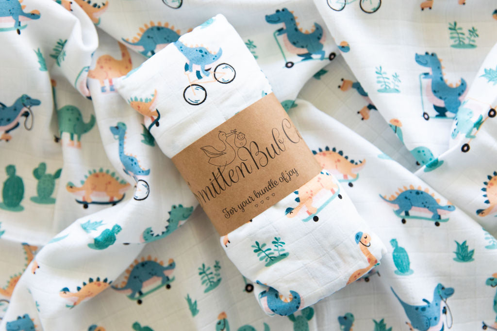 Bamboo Muslin and Organic cotton swaddle wrap Dinosaurs on bikes and skateboards print